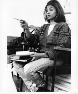 Picture of director with script pointing